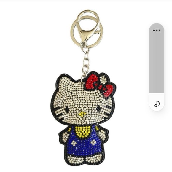 Saniro Other - Sandro Hello Kitty Puffy Tassle Rinestone Keychain, Purse, Fab Blue
